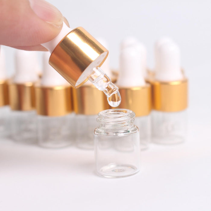 15 Pieces Glass Dropping Bottles Portable Refillable for Perfume Storage 1ml Clear Golden